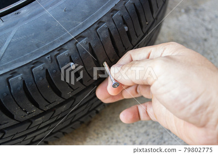 Screw in tyre stuck inside it, concept checked and removing Screw in tyre stuck inside it, concept checked and removing 79802775