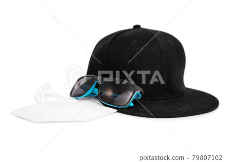 Snapback cap, sunglasses and a face mask Snapback cap, sunglasses and a face mask 79807102