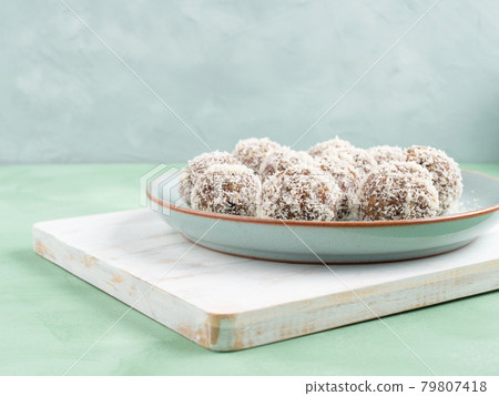 Home made energy protein balls with coconut flakes and nut butter 79807418