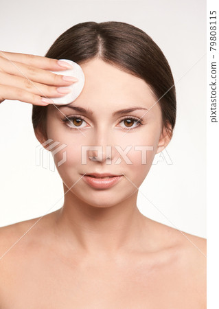 Young white girl remove mascara. Face makeup 79808115