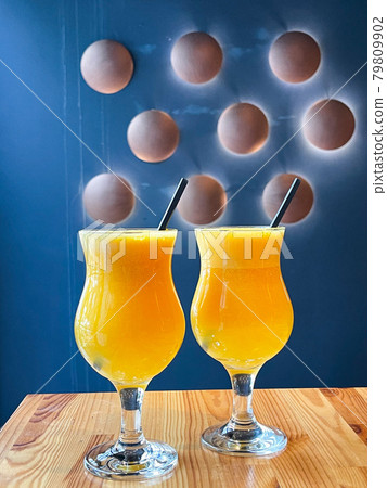 Close-up two glasses of Orange Juice. summer time Close-up two glasses of Orange Juice. summer time 79809902
