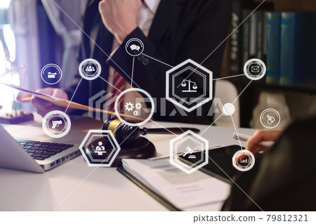 Business and lawyers discussing contract papers with brass scale on desk in office. Law, legal services, advice,  justice and law concept with VR icon .. 79812321