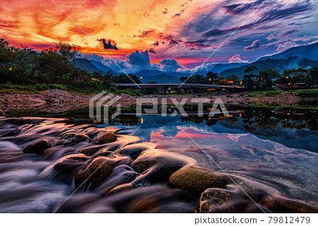 Landscape image of brook and rocks in the valley at Kiriwong village, Nakorn Sri Thammarat, Thailand. Landscape image of brook and rocks in the valley at Kiriwong village, Nakorn Sri Thammarat, Thailand. 79812479