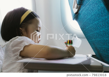 Girls on airplane 79813018