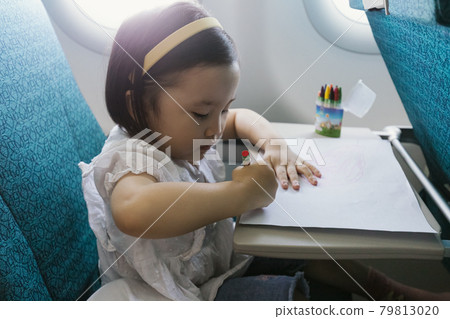 Girls on airplane 79813020
