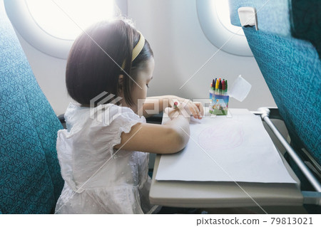Girls on airplane 79813021