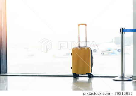 suitcase waiting on airport suitcase waiting on airport 79813985