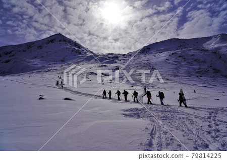 A group of climbers heading from Tateyama Murodo to Mt. Jodo in winter 79814225