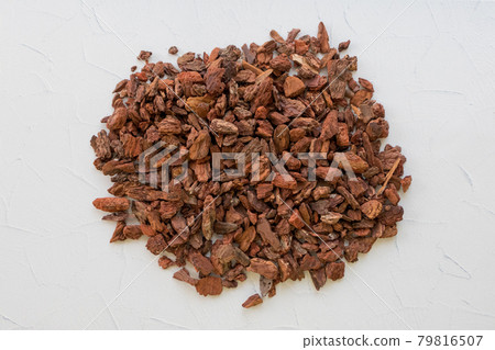 Burke chips on a white floor Burke chips on a white floor 79816507