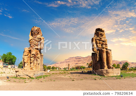 The Colossi of Memnon, famous statues of Luxor, Egypt The Colossi of Memnon, famous statues of Luxor, Egypt 79820634