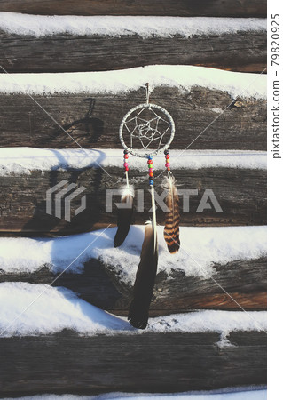 Dream catcher with sunset on the background Dream catcher with sunset on the background 79820925