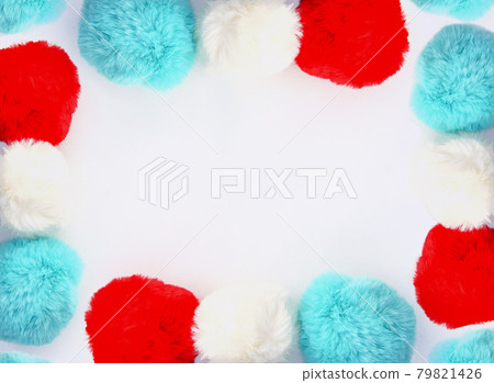 Colorful fluffy pompons on white background.  79821426