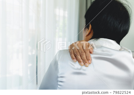 neck and shoulder pain, old woman suffering from neck and shoulder injury, health problem concept neck and shoulder pain, old woman suffering from neck and shoulder injury, health problem concept 79822524