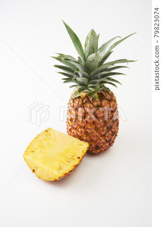 Pineapple fruit on a white background Pineapple fruit on a white background 79823074
