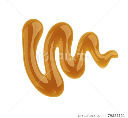 Caramel sauce isolated on white background, top view Caramel sauce isolated on white background, top view 79823131