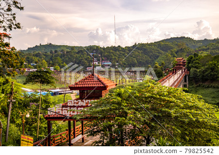 Mon Bridge, old wooden bridge at sunset in Sangkhlaburi, Kanchanaburi, Thailand Mon Bridge, old wooden bridge at sunset in Sangkhlaburi, Kanchanaburi, Thailand 79825542
