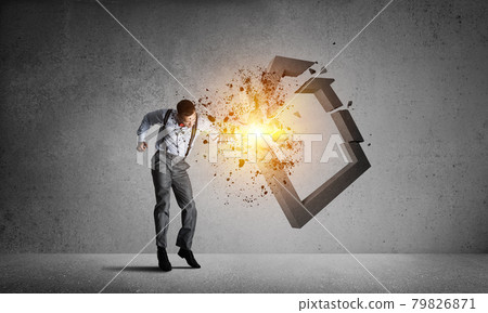 Stone home silhouette as symbol for real estate insurance crashed by man 79826871