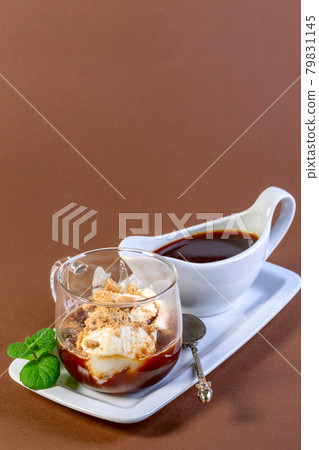 Affogato (Italian for "drowned") is an Italian coffee dessert. Affogato (Italian for "drowned") is an Italian coffee dessert. 79831145