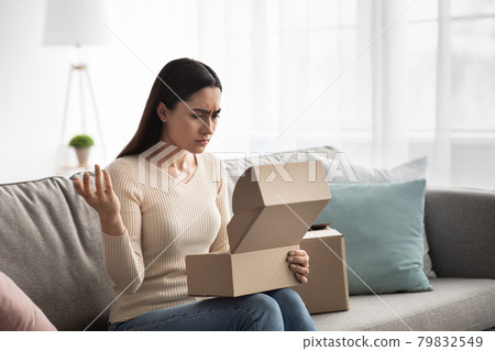 Covid-19 quarantine, negative human emotions, spoiled goods, mistake, disappointment of unpacking Covid-19 quarantine, negative human emotions, spoiled goods, mistake, disappointment of unpacking 79832549