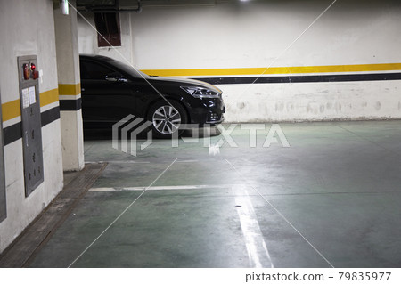 Passenger car parked in the underground parking lot 79835977