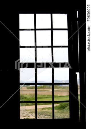 A window with broken glass A window with broken glass 79836005