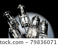 Several halogen small incandescent lamps with a blurry background 79836071
