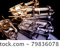 Several halogen small incandescent lamps with a blurry background 79836078