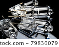 Several halogen small incandescent lamps with a blurry background 79836079