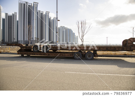 Trailer truck on the street 79836977