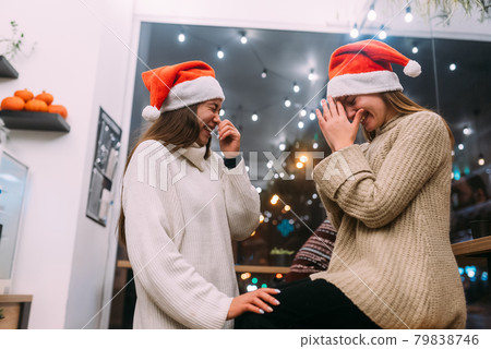 Portrait of happy cute young friends having fun in cafe 79838746