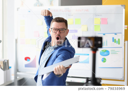 Emotionally motivated male coach conducts online business training 79838969