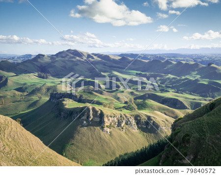 Rolling green hills and blue sky panorama,Shot from Te Mata Peak near Hastings, Hawkes Bay region of North Island, New Zealand Rolling green hills and blue sky panorama,Shot from Te Mata Peak near Hastings, Hawkes Bay region of North Island, New Zealand 79840572