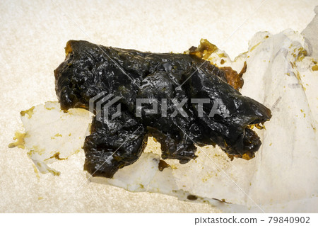 medical marijuana shatter wax processed cannabis concentrate closeup in california medical marijuana shatter wax processed cannabis concentrate closeup in california 79840902