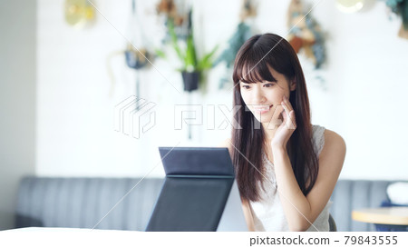 Female skin care image looking in the mirror Female skin care image looking in the mirror 79843555