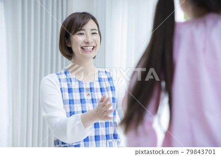 6 year old girl and mom 79843701