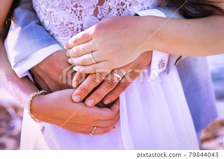 Wedding wedding couple with hands together holding hands. Wedding wedding couple with hands together holding hands. 79844043