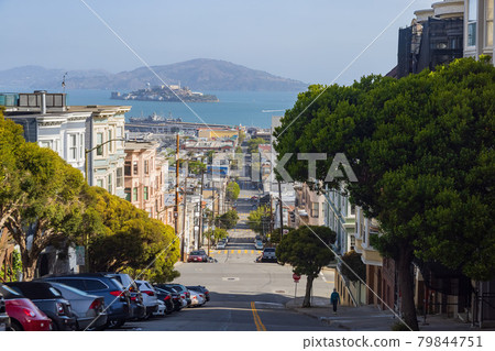 Sunny view of the Alcatraz Island and San Francisco Bay with some residence building Sunny view of the Alcatraz Island and San Francisco Bay with some residence building 79844751
