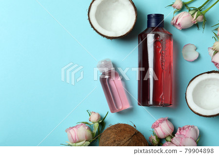 Natural shower gel and ingredients on blue background Natural shower gel and ingredients on blue background 79904898
