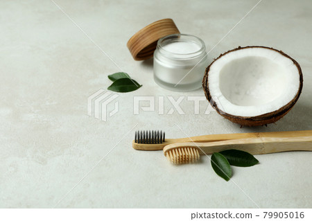 Oral care accessories on white textured background 79905016