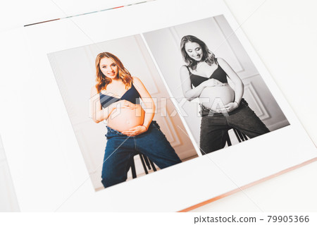 top view. photobook from photo shoot pregnancy. 79905366