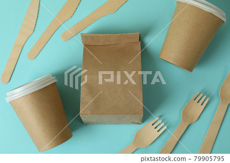 Food delivery disposable tableware on blue background 79905795