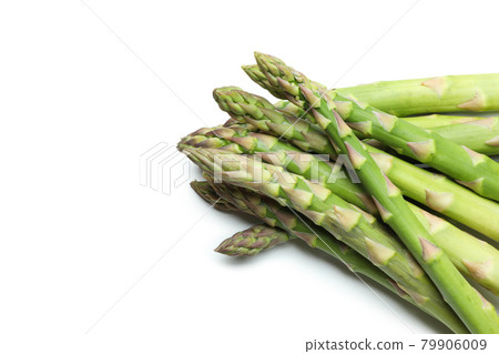 Fresh green asparagus isolated on white background Fresh green asparagus isolated on white background 79906009