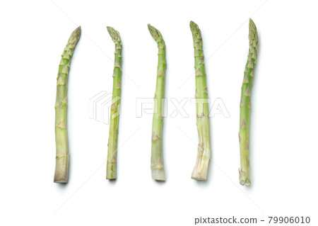 Fresh green asparagus isolated on white background Fresh green asparagus isolated on white background 79906010