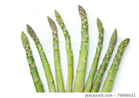 Fresh green asparagus isolated on white background Fresh green asparagus isolated on white background 79906011