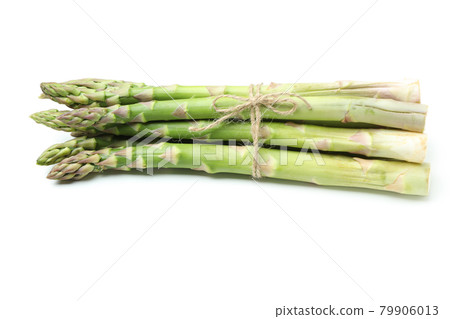 Fresh green asparagus isolated on white background Fresh green asparagus isolated on white background 79906013