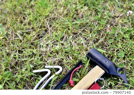 Camp image hammer and peg Camp image hammer and peg 79907140