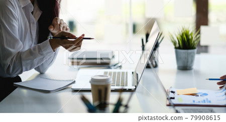 Business woman or accountant making working audit with her team. finance and accounting concept. Business woman or accountant making working audit with her team. finance and accounting concept. 79908615