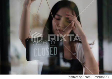 Store Owner Turning Closed. Stressed owner forced to close the coffee shop permanently due to restrictions on the COVID-19 Store Owner Turning Closed. Stressed owner forced to close the coffee shop permanently due to restrictions on the COVID-19 79908667