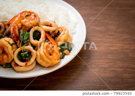 rice and stir-fried seafood with Thai basil 79923593