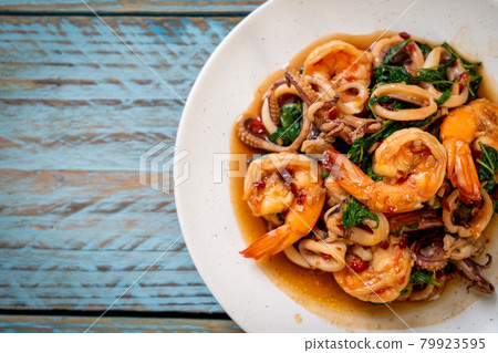 stir-fried seafood with Thai basil 79923595